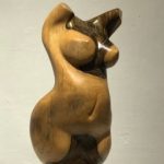 Angel de la Rosa: Wooden sculpture.