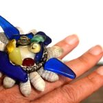 Wedding ring Philippe made for his bride. The blue pieces of glass form a bird, which is a symbol of love in Philippe's oeuvre.